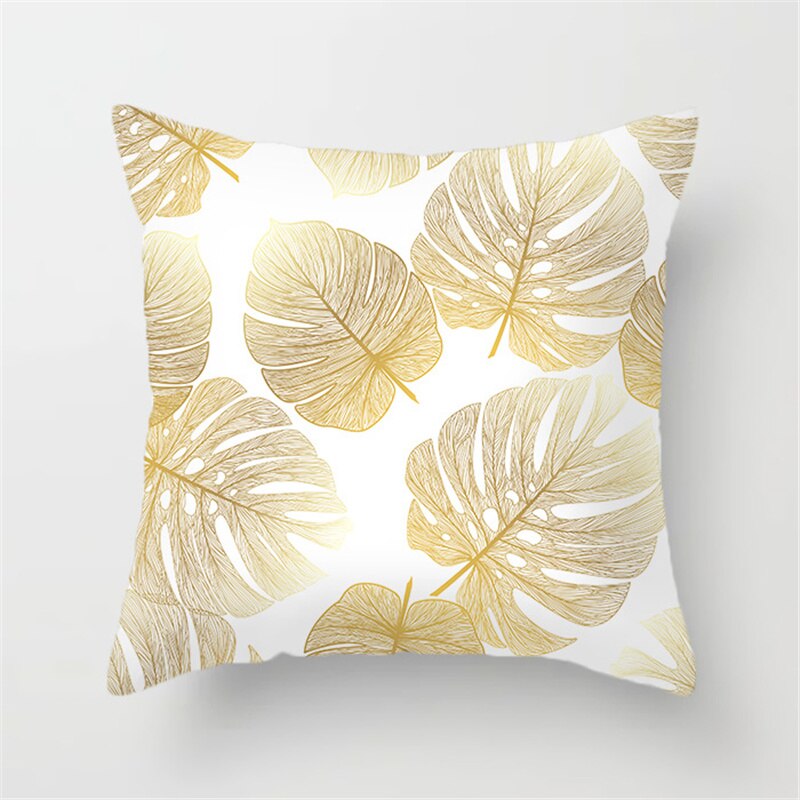 Gold Leaf Cushion Cover showcasing an elegant gold leaf pattern on a soft polyester fabric, perfect for home decor.