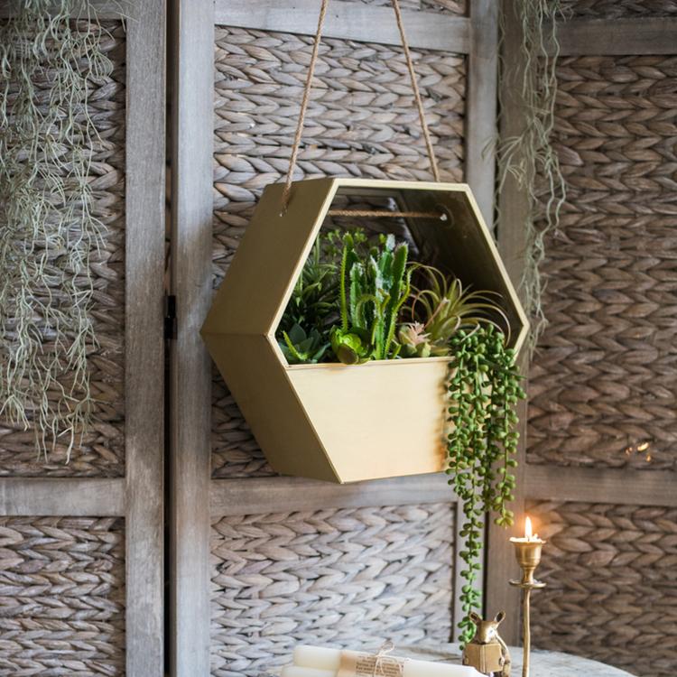 Gold Metal Hexagon Hanging Planter showcasing its modern design and durable construction, perfect for indoor and outdoor decor.