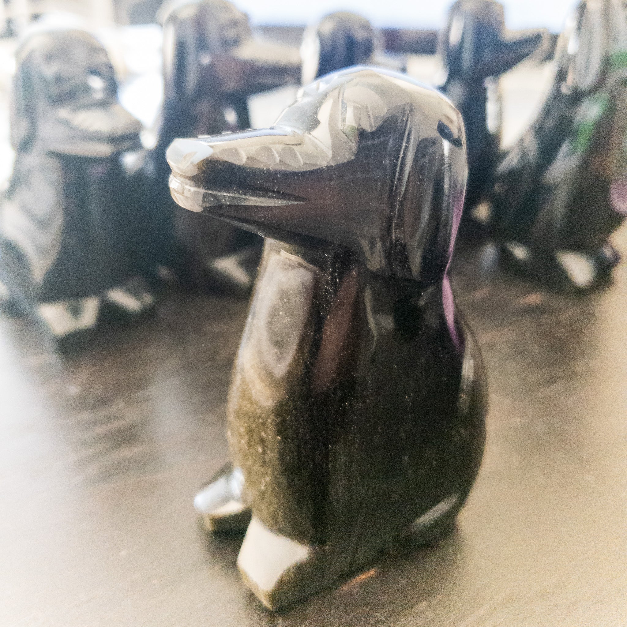 Handmade Gold Sheen Obsidian Dog Figurine, 4 inches tall, showcasing unique sheen and craftsmanship.