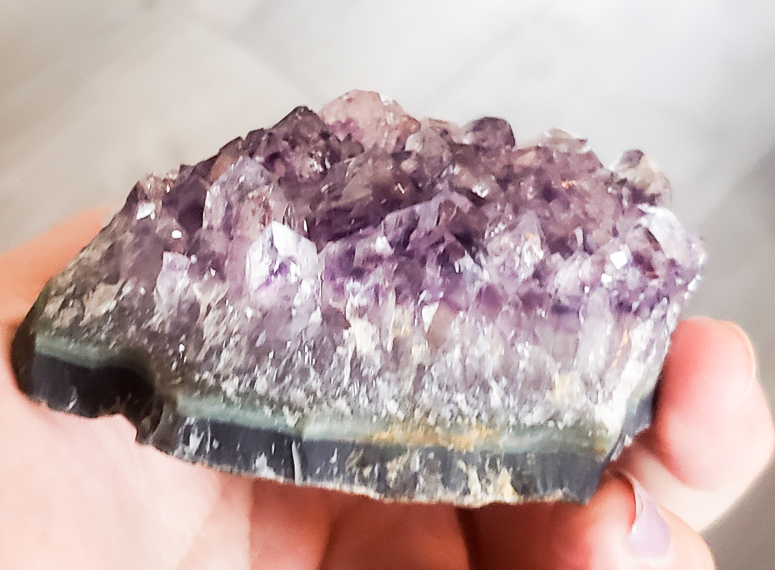 Grade A Amethyst Druzy Crystals showcasing deep to light purple hues with sparkling druzy points, perfect for decor and gifts.