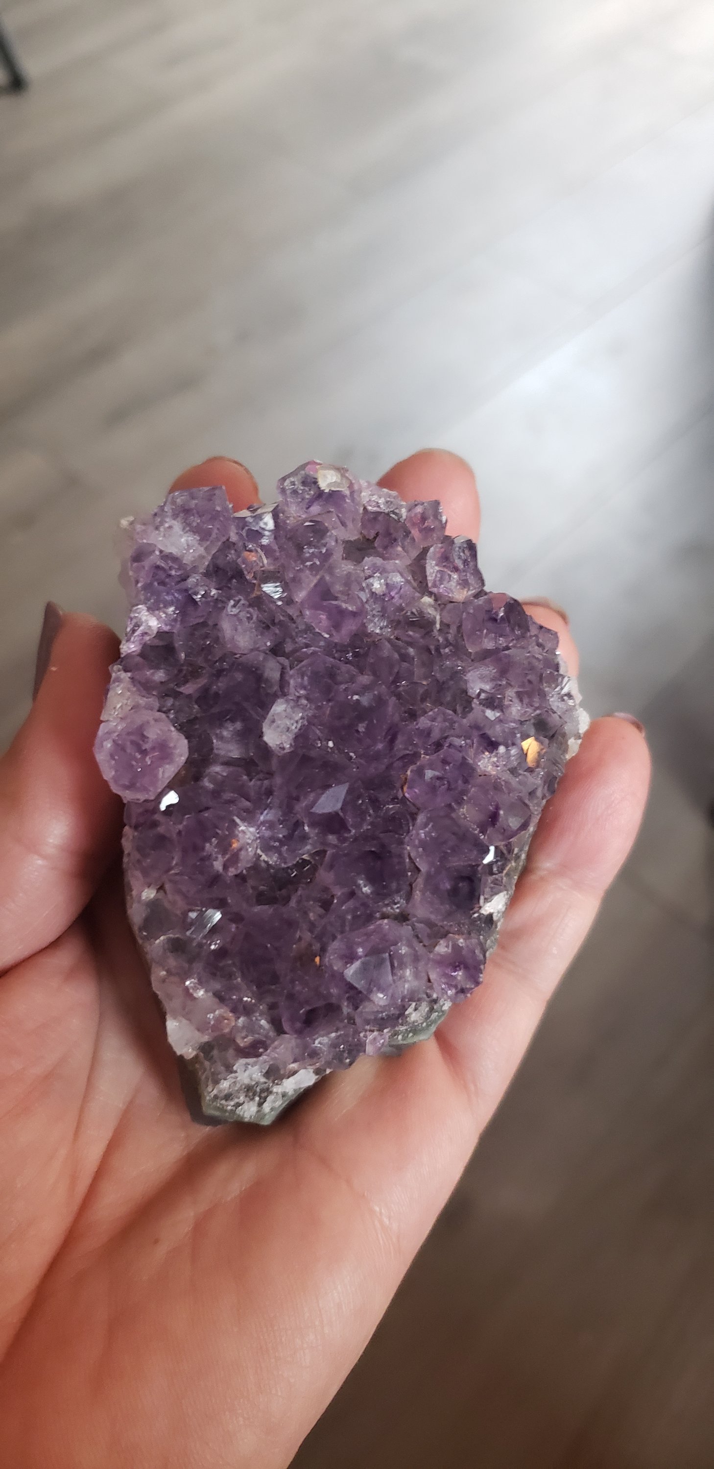 Grade A Amethyst Druzy Crystals showcasing deep to light purple hues with sparkling druzy points, perfect for decor and gifts.