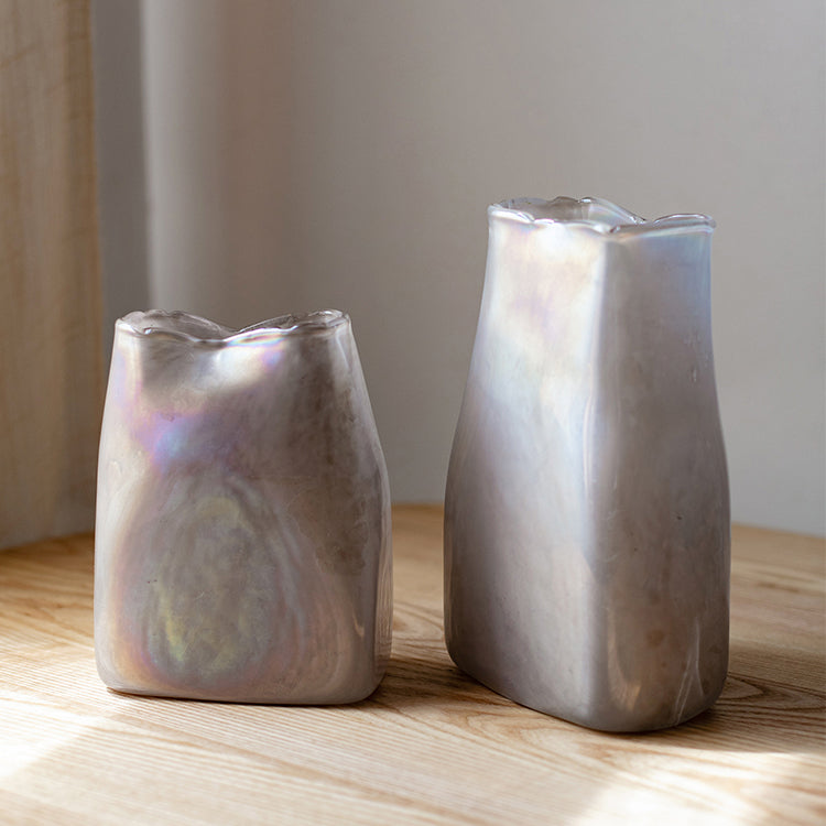 A beautifully crafted Gradient Color Art Glass Vase featuring a unique blend of pink and cream colors, showcasing its hand-blown design.