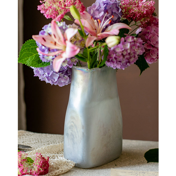 A beautifully crafted Gradient Color Art Glass Vase featuring a unique blend of pink and cream colors, showcasing its hand-blown design.