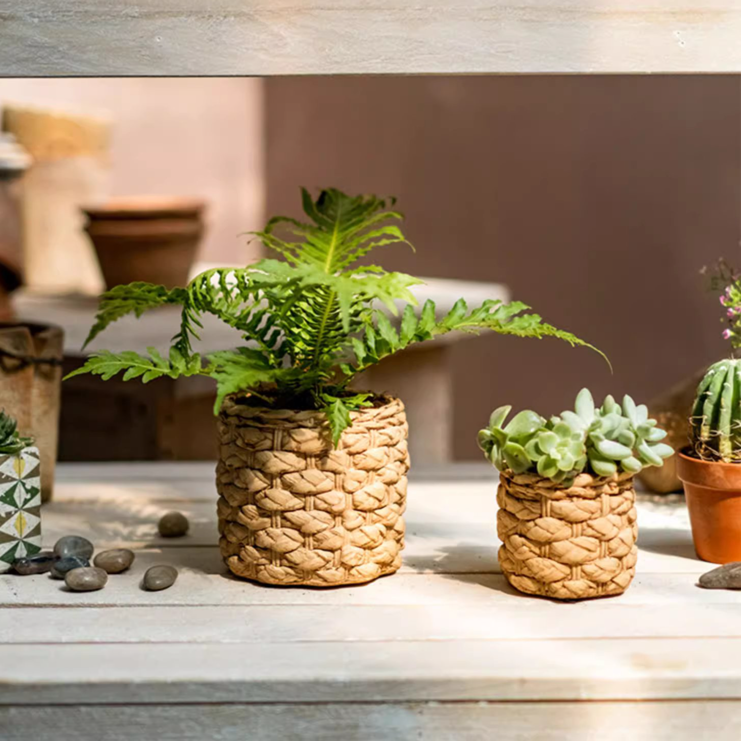 Grass Woven Looking Cement Planter in khaki and brown, showcasing its unique woven design and drainage hole.