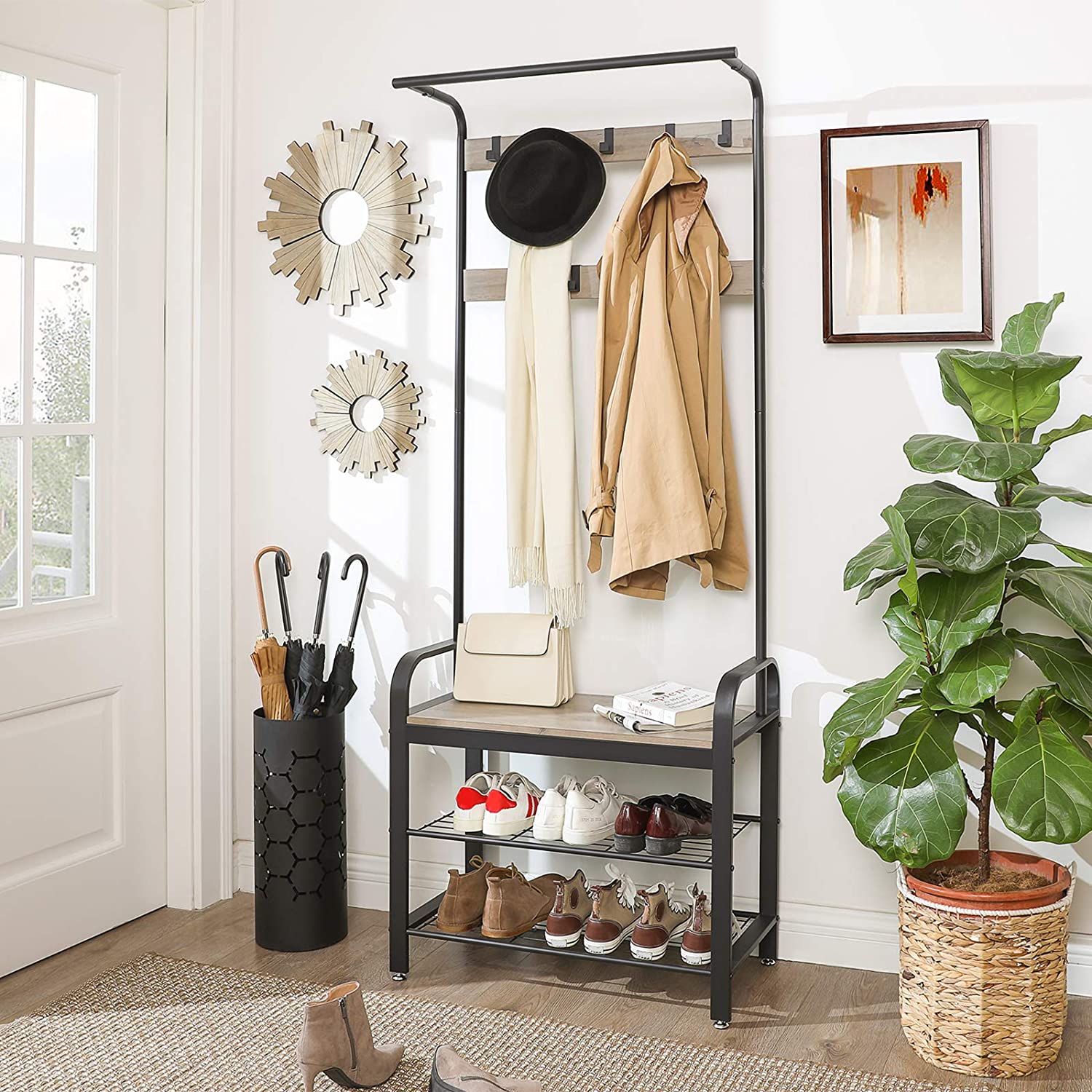 Greige and black steel freestanding coat rack with removable hooks, bench, and shoe rack, showcasing its stylish design and functionality.