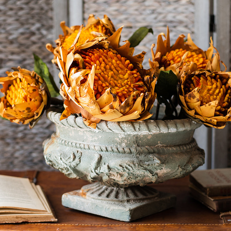 Greek Corinthian Style Flower Vase with ornamental carvings, showcasing a vintage design in ivory color, perfect for floral arrangements.