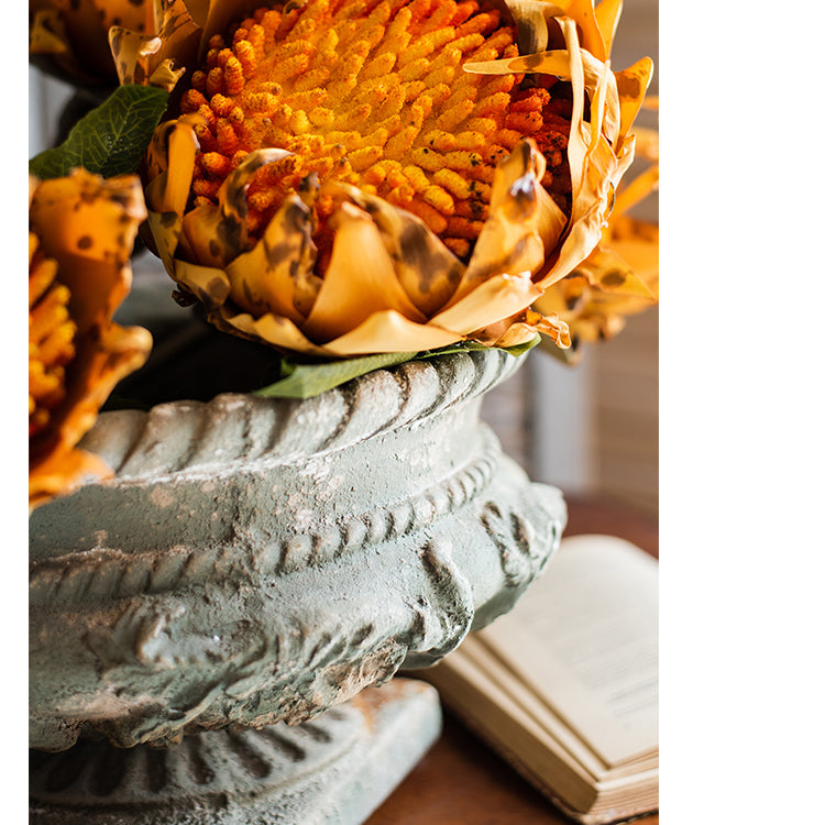 Greek Corinthian Style Flower Vase with ornamental carvings, showcasing a vintage design in ivory color, perfect for floral arrangements.