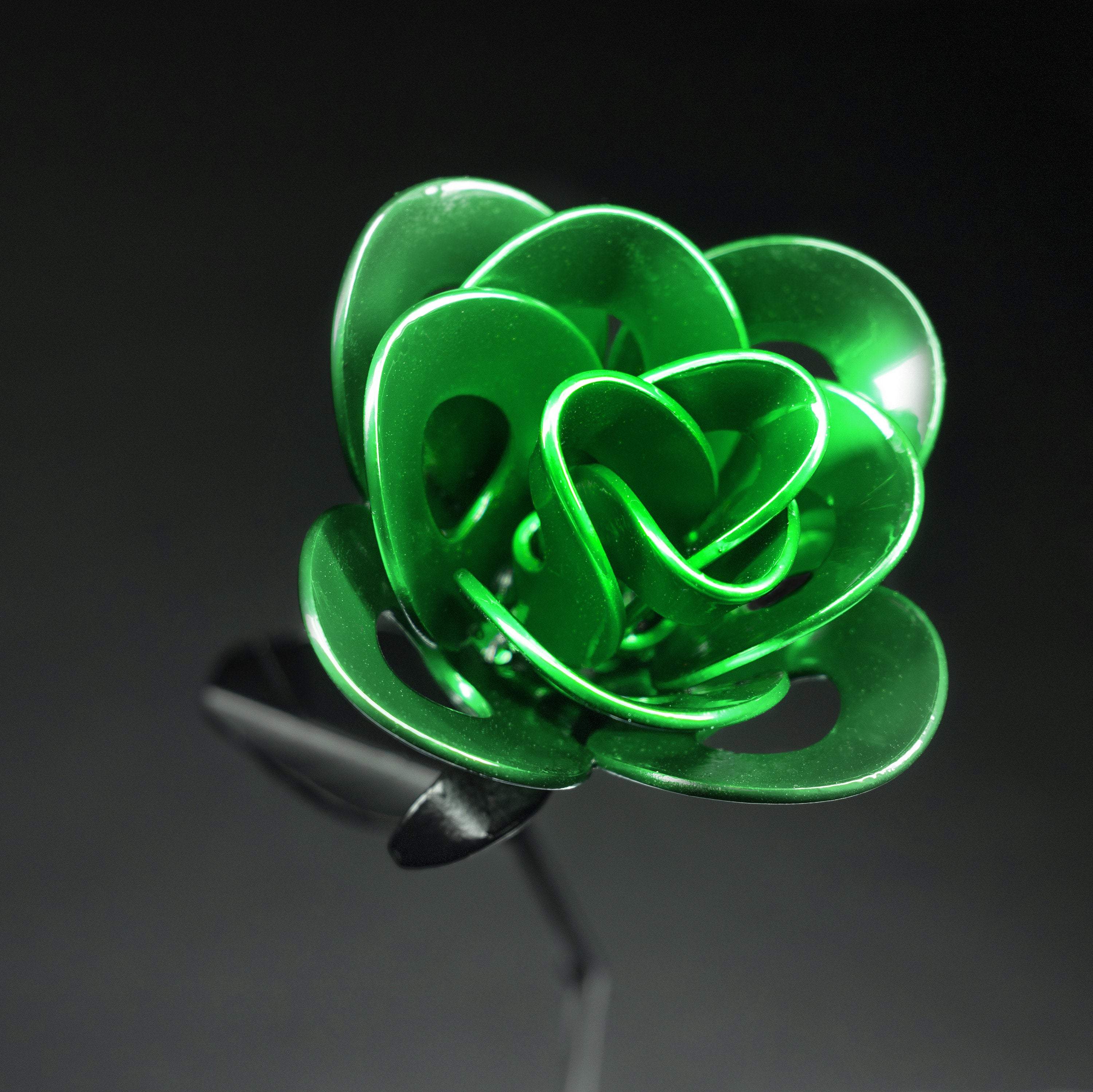 Handcrafted Green and Black Immortal Rose made from recycled metal, featuring a lustrous green head and matte black stem, elegantly packaged in a clear box.