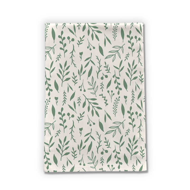 Green Falling Leaves Tea Towel made of cotton twill, featuring a vibrant leaf design, perfect for kitchen decor.