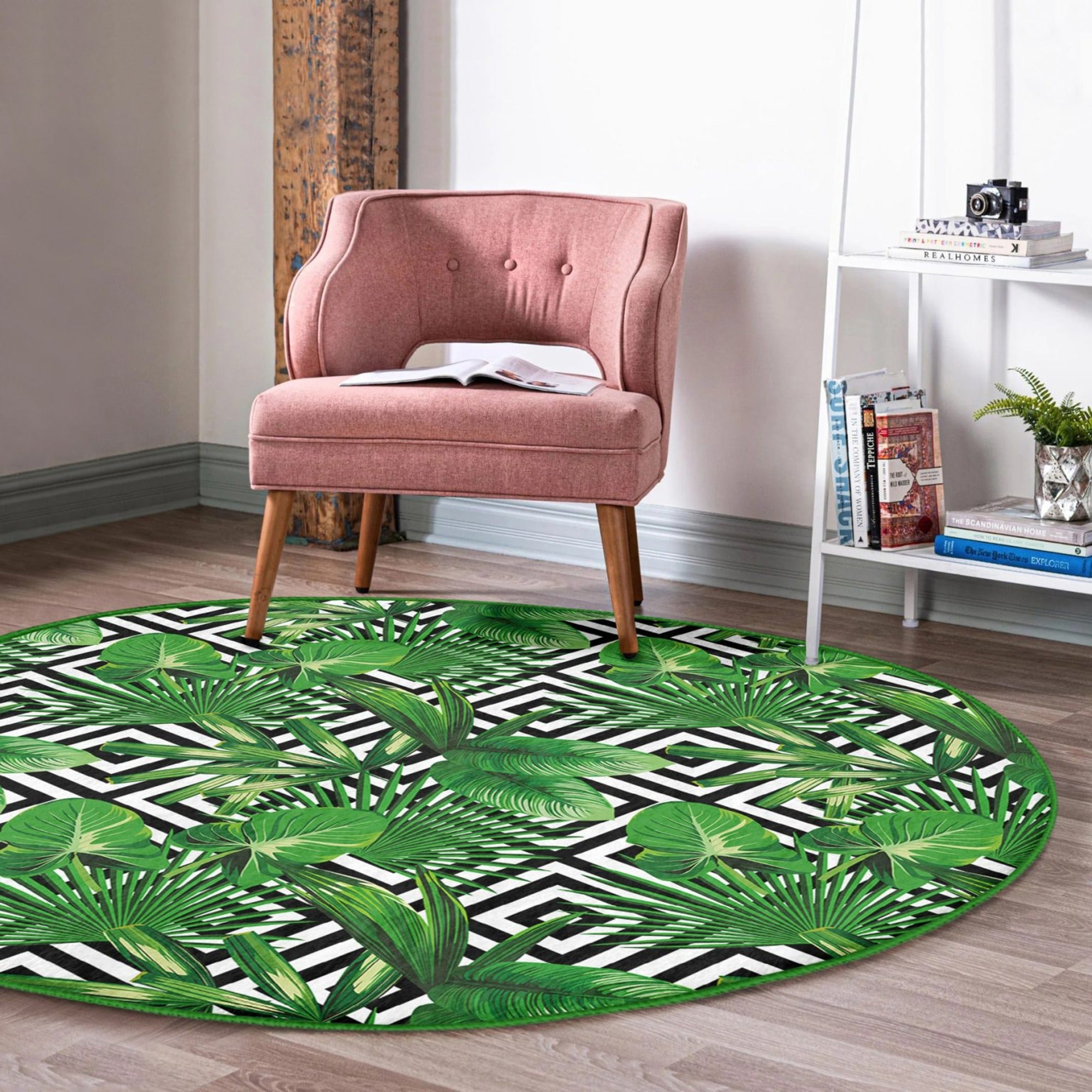 A beautiful green floral design round rug made of soft velvet fabric, showcasing vibrant colors and intricate floral patterns.