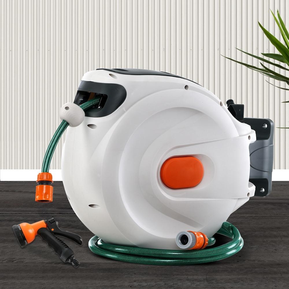 Greenfingers Retractable Hose Reel with 20M hose and spray gun, showcasing its compact design and sturdy build.