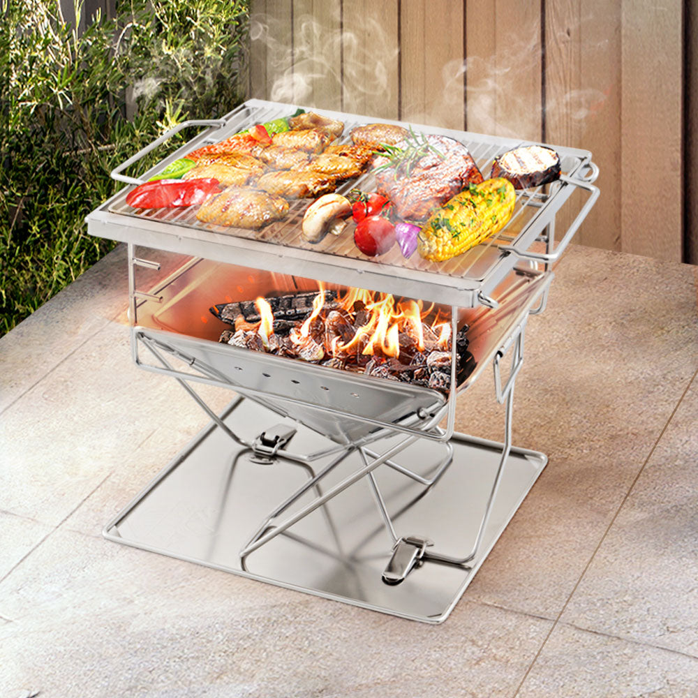 Grillz Portable Fire Pit BBQ made of stainless steel, showcasing its folding design and height-adjustable grill rack, perfect for outdoor cooking.