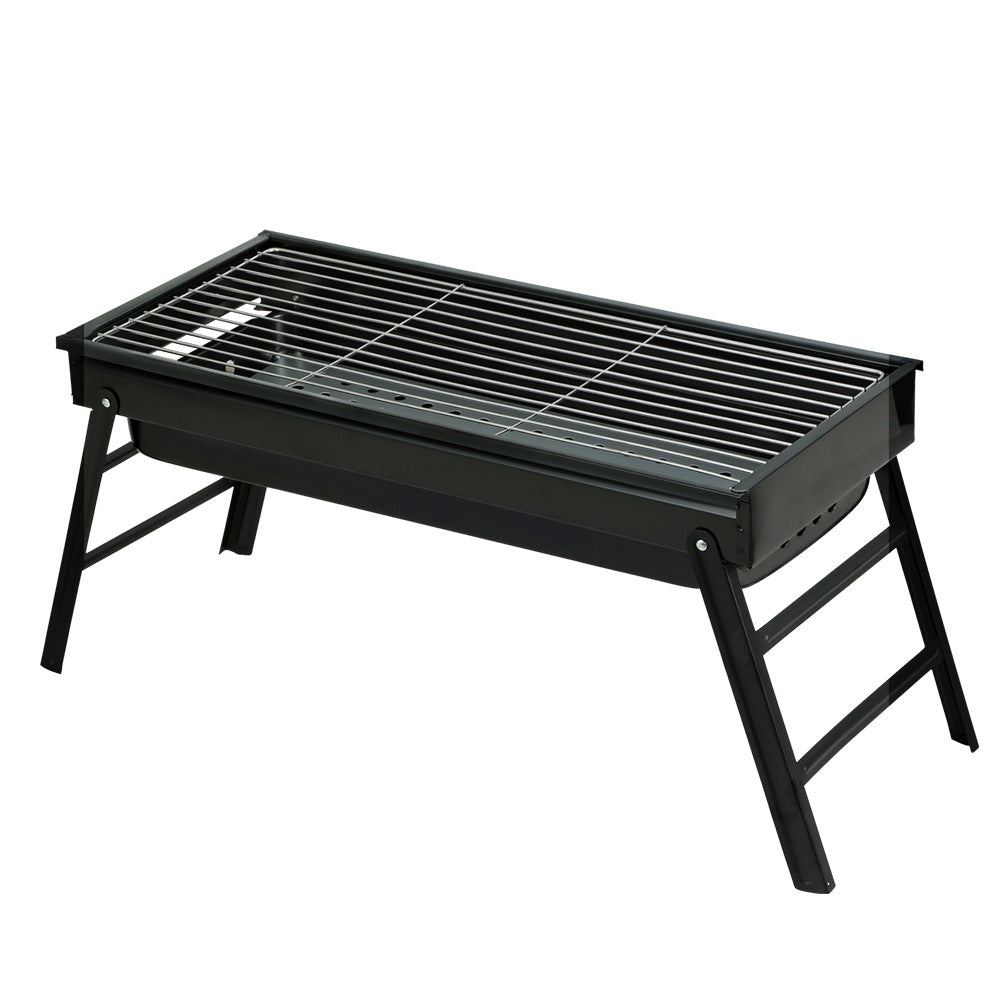 Grillz Charcoal BBQ Grill Smoker with foldable legs and stainless steel grill top, perfect for outdoor cooking.