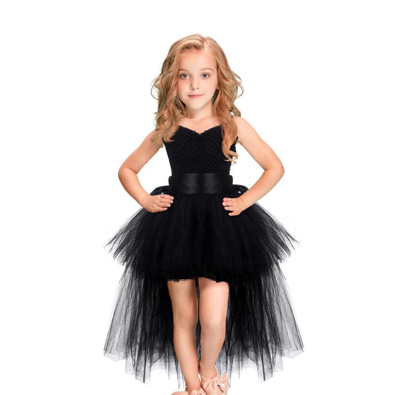 Baby girl wearing a beautiful Halloween and Christmas princess dress with lace and tutu details, perfect for festive occasions.