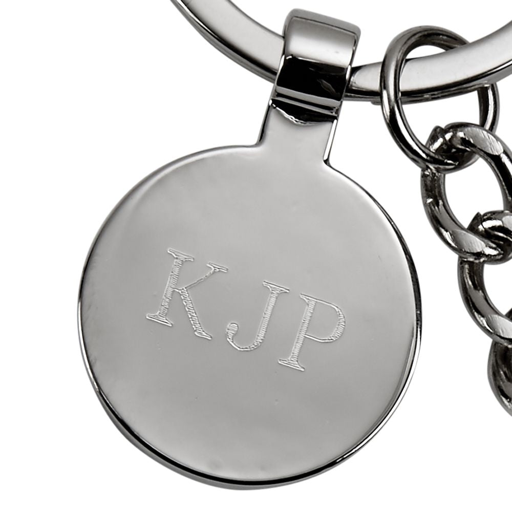 A polished nickel-plated hammer keychain with an engraving tag, presented in a black gift box.