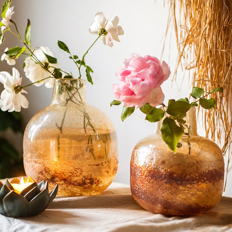 Hand Blown Bubble Glass Bud Vase in Amber, showcasing a textured finish and unique shape, perfect for floral arrangements.