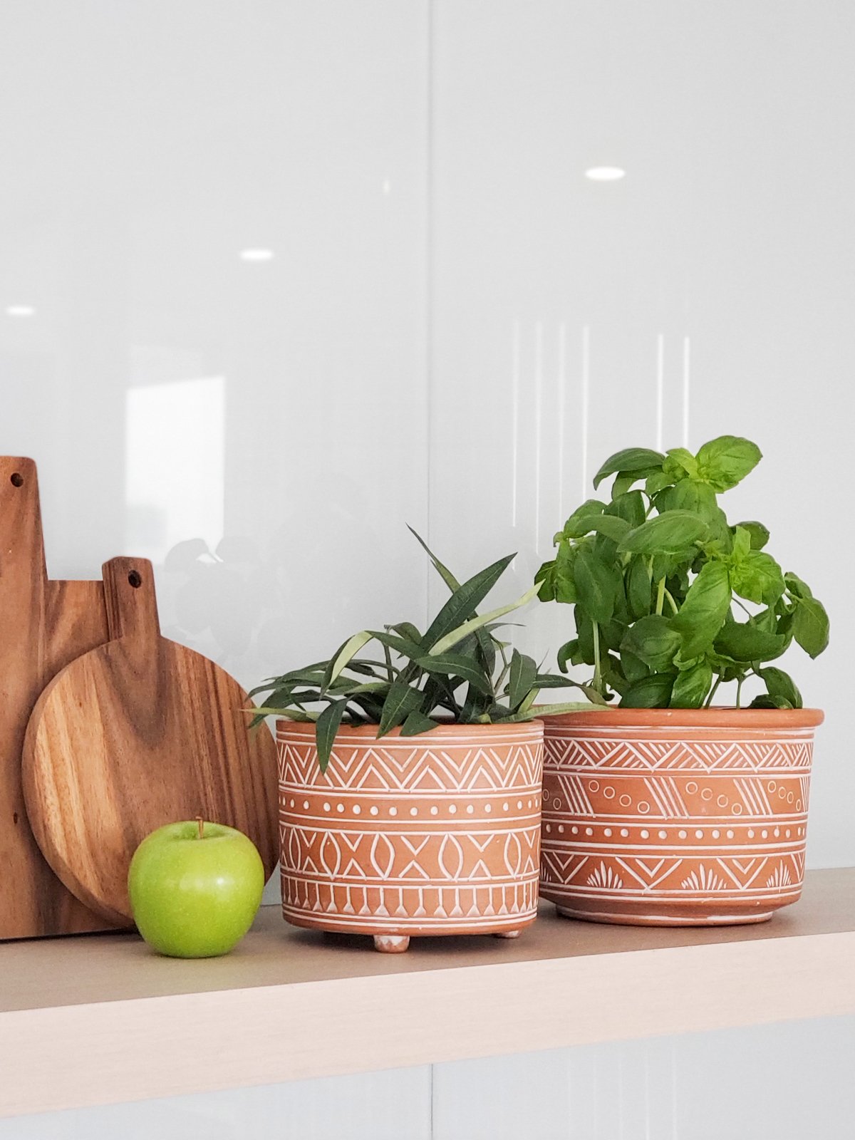 Large hand-etched terracotta pot showcasing intricate designs, perfect for indoor and outdoor plants.