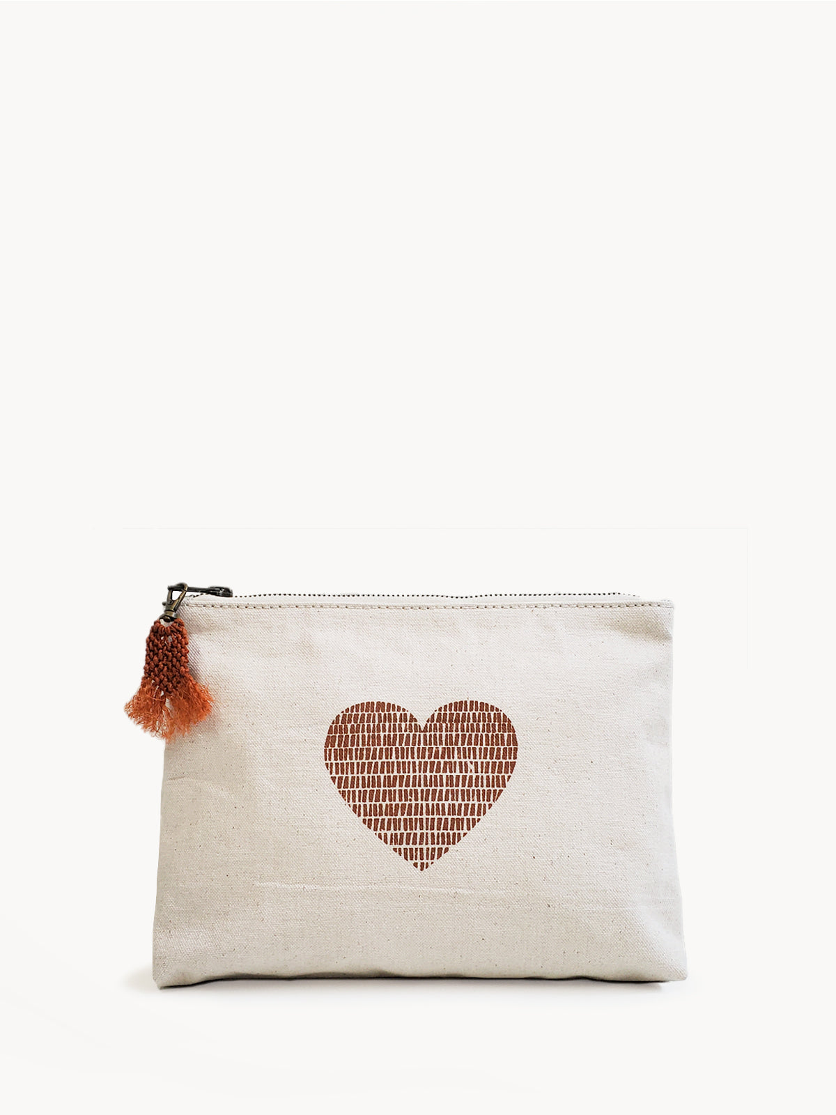 Hand screen printed cotton canvas pouch with hemp tassel, featuring a cinnamon color print on natural cream fabric.