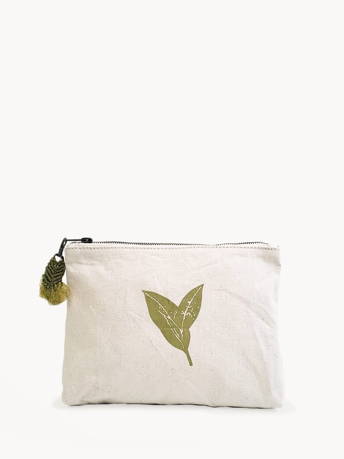 Hand screen printed cotton canvas pouch featuring a natural cream color with green print and a handwoven hemp tassel.