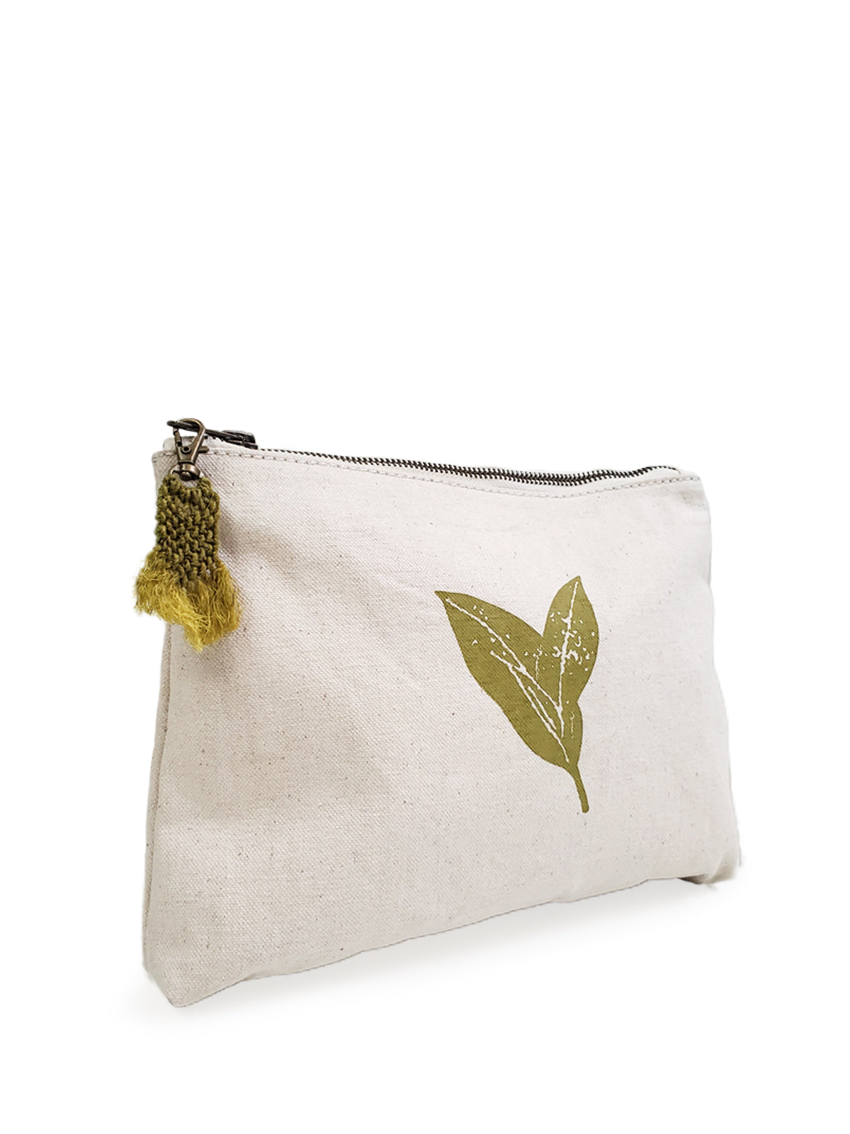 Hand screen printed cotton canvas pouch featuring a natural cream color with green print and a handwoven hemp tassel.