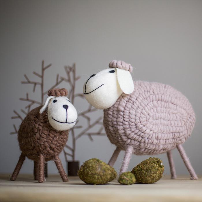 A charming set of three handmade wool sheep knick-knacks in various colors, perfect for home decor.