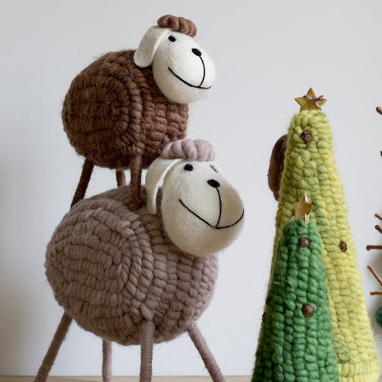 A charming set of three handmade wool sheep knick-knacks in various colors, perfect for home decor.