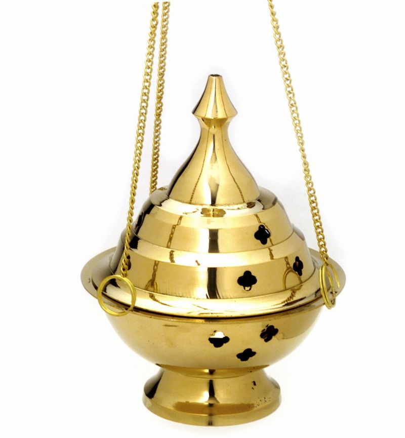 A 5-inch hanging brass incense burner with star cutouts, elegantly designed for burning various types of incense.