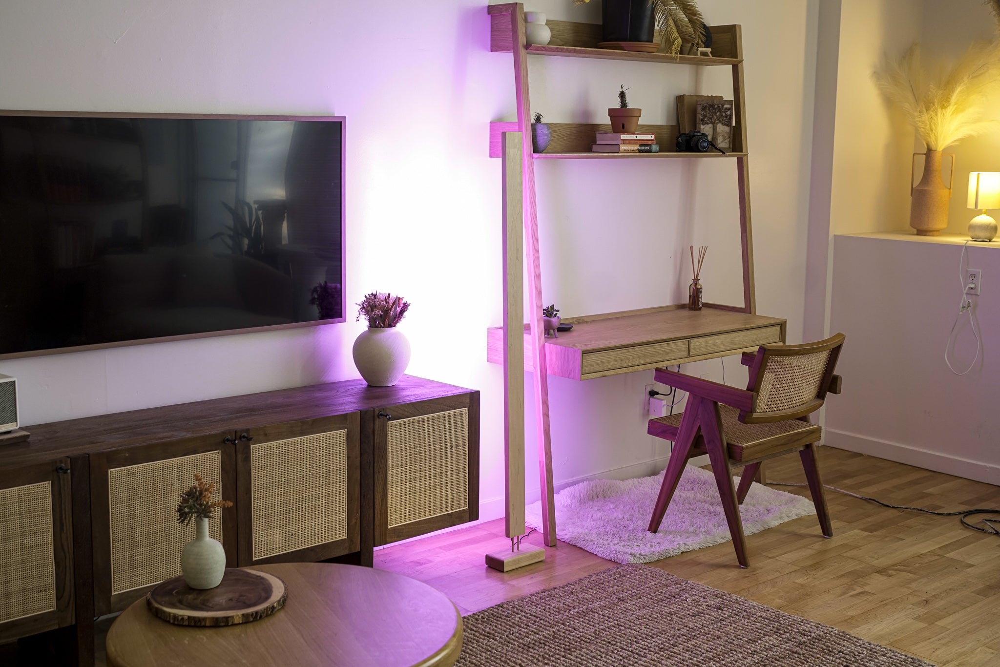 A sleek Hardwood LED Color Floor Lamp made from sustainably sourced Black Walnut and White Maple, featuring a slim design and colorful RGB lighting.