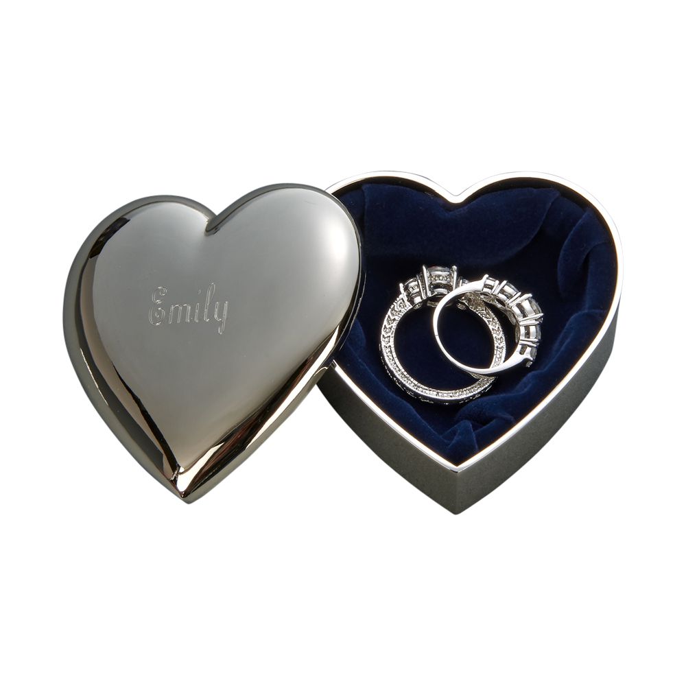 A charming heart-shaped box with a dark blue flocked interior, perfect for gifts and keepsakes.