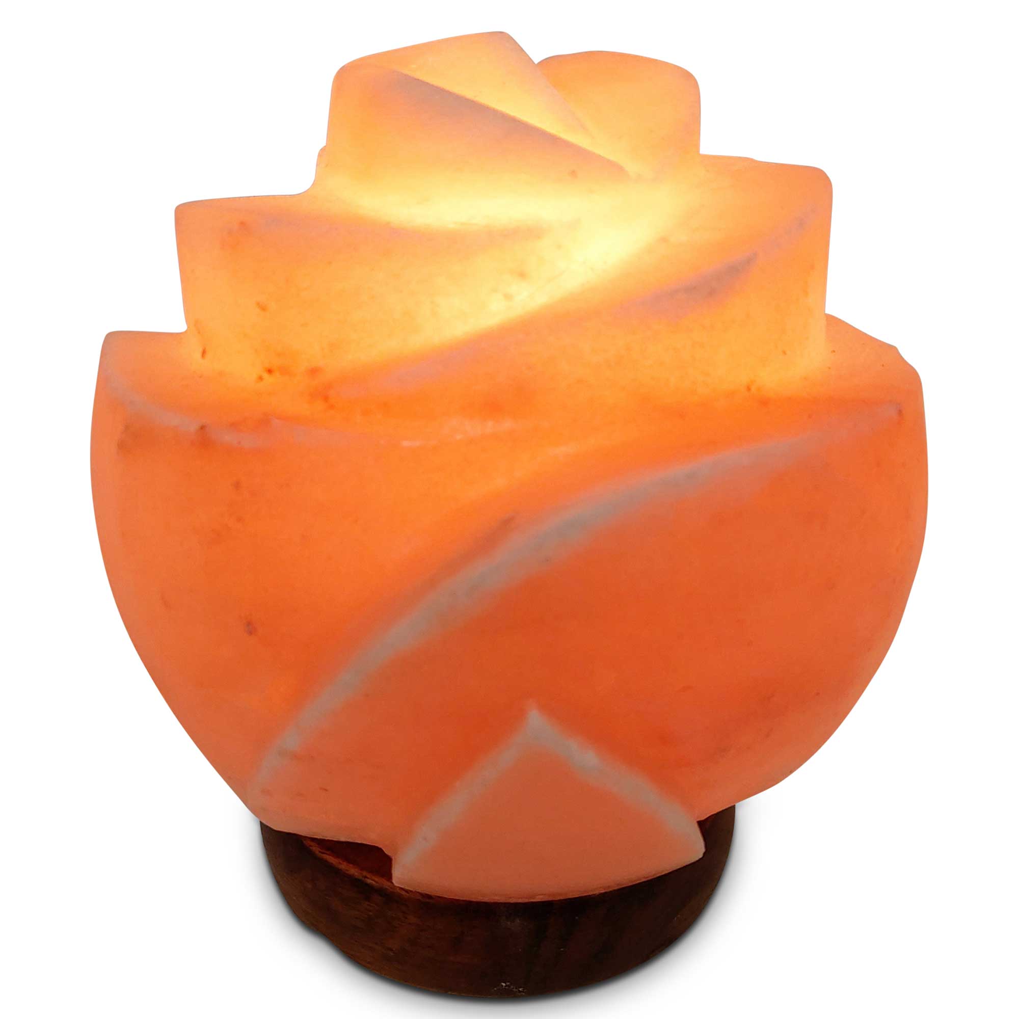 A beautifully carved Himalayan Pink Salt Lamp emitting a warm glow, showcasing its unique shape and natural texture.