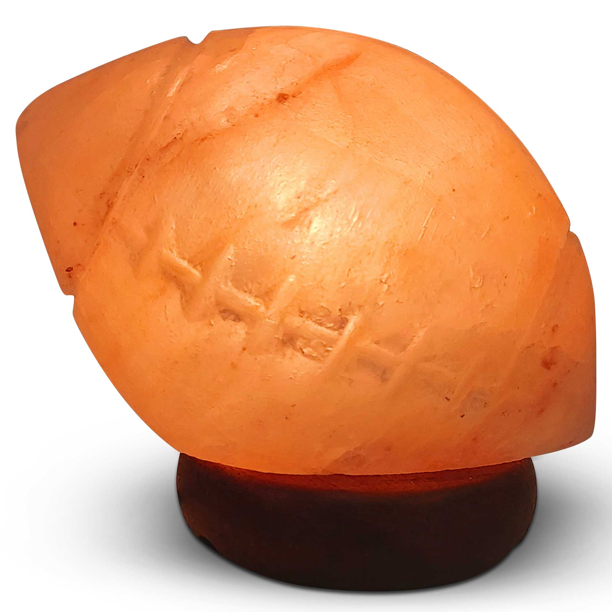 A beautifully carved Himalayan Pink Salt Lamp emitting a warm glow, showcasing its unique shape and natural texture.