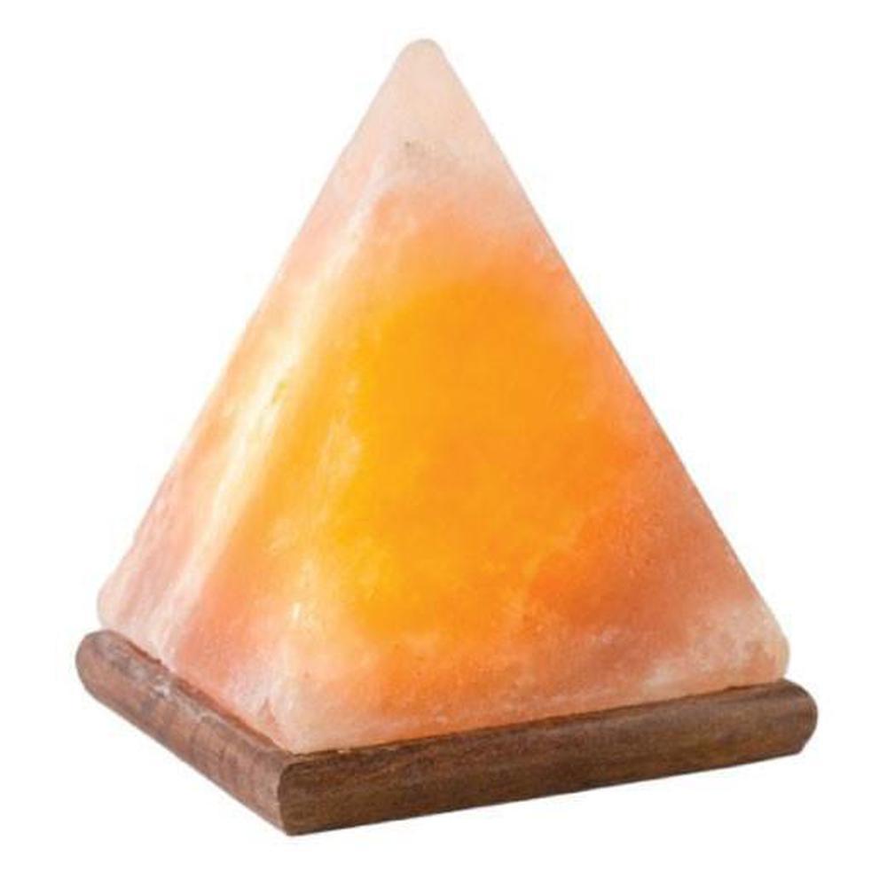 A beautifully carved Himalayan Pink Salt Lamp emitting a warm glow, showcasing its unique shape and natural texture.