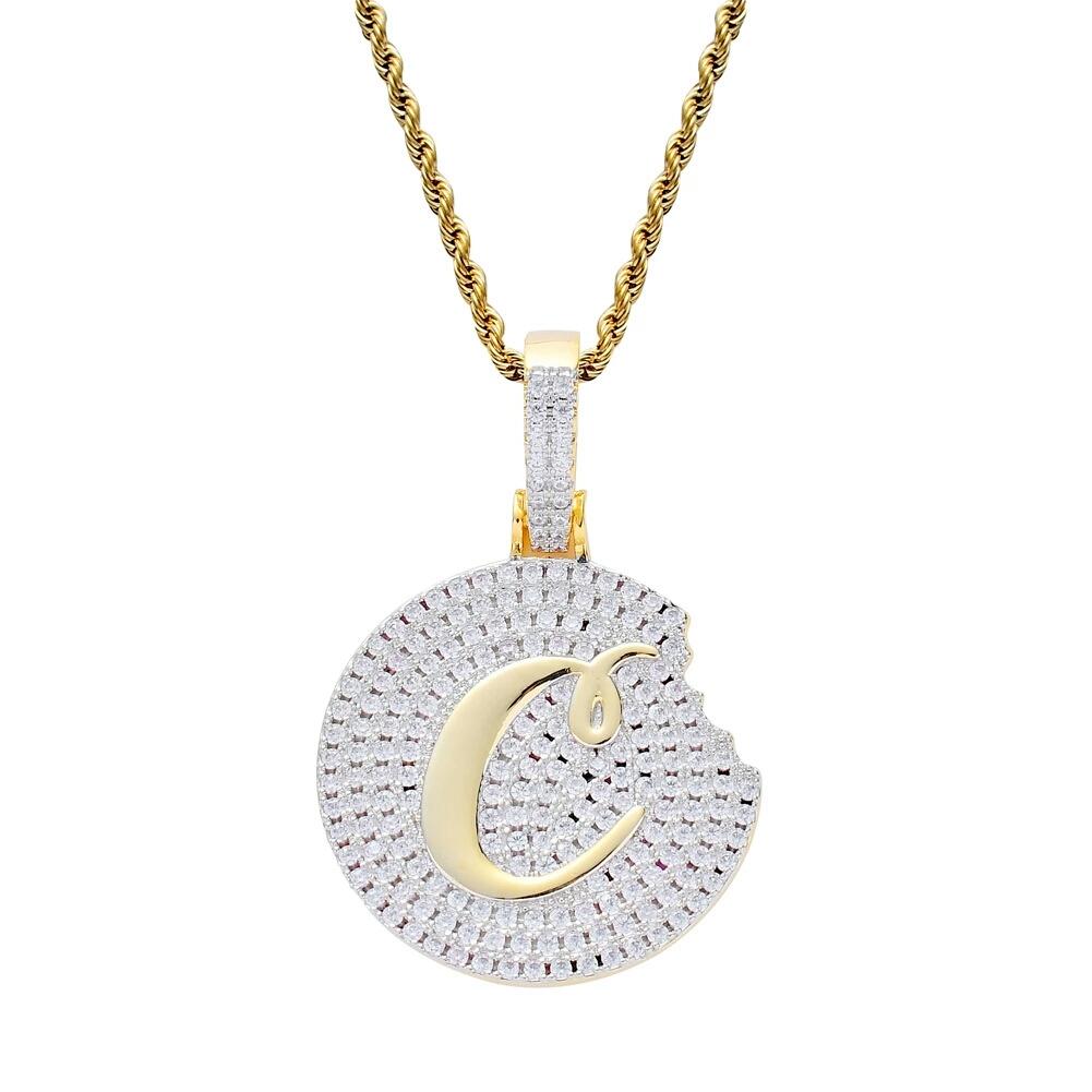 Hip hop cookie diamonds pendant necklace featuring luxury crystal accents and 18K gold plating, displayed elegantly on a neutral background.