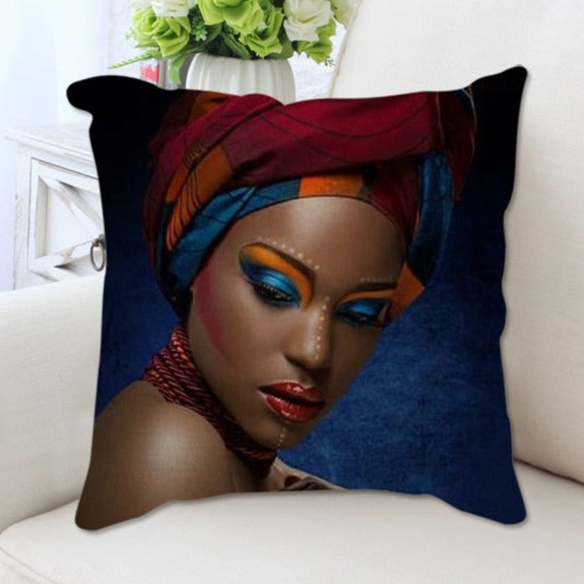 A plush cushion cover featuring a vibrant African woman portrait, showcasing cultural elegance and artistic design.