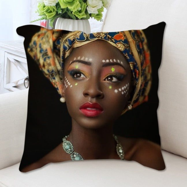 A plush cushion cover featuring a vibrant African woman portrait, showcasing cultural elegance and artistic design.