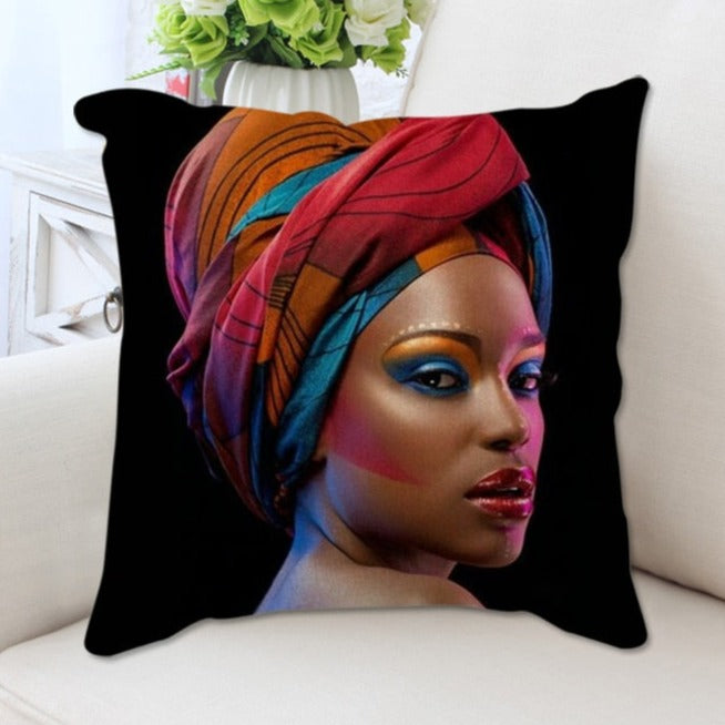 A plush cushion cover featuring a vibrant African woman portrait, showcasing cultural elegance and artistic design.