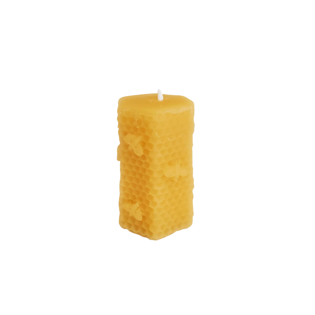 A beautifully crafted Honeycomb Candle with a unique texture, standing 3.2 inches tall, perfect for home decor.