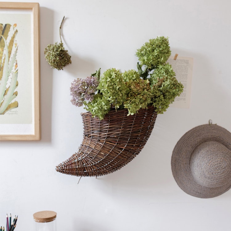 Horn Shape Willow Hanging Basket Planter in brown, showcasing its unique design and natural material.