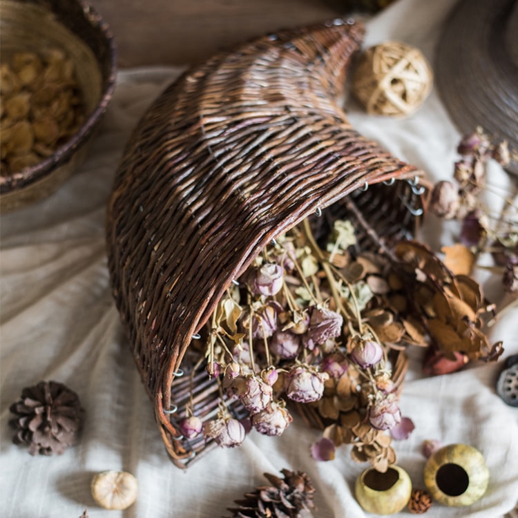 Horn Shape Willow Hanging Basket Planter in brown, showcasing its unique design and natural material.