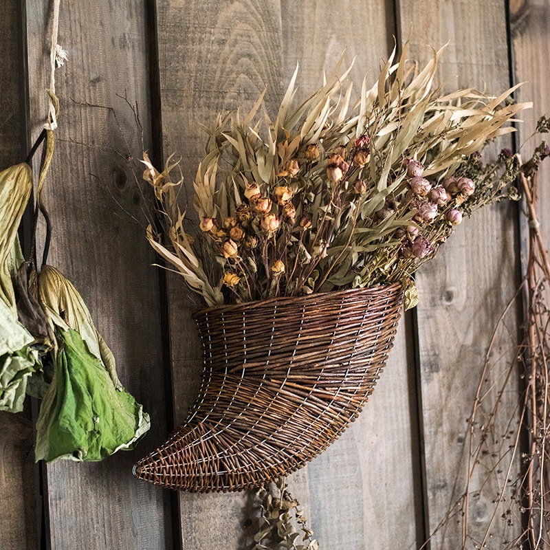 Horn Shape Willow Hanging Basket Planter in brown, showcasing its unique design and natural material.