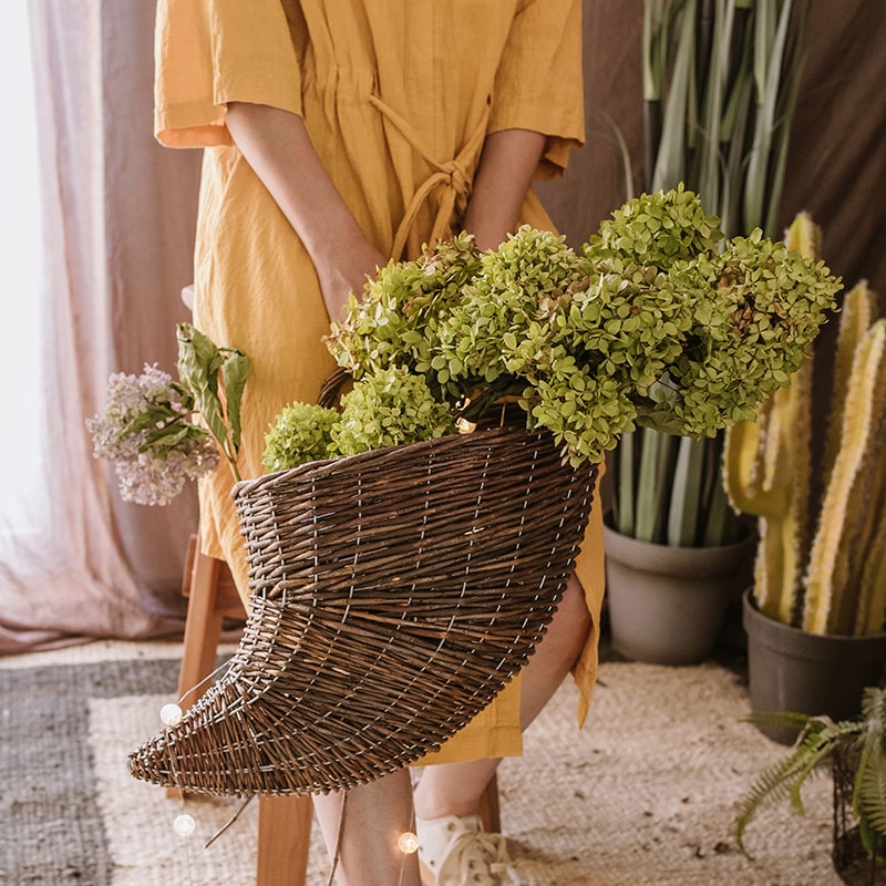 Horn Shape Willow Hanging Basket Planter in brown, showcasing its unique design and natural material.