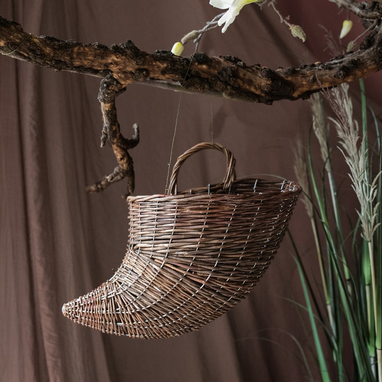 Horn Shape Willow Hanging Basket Planter in brown, showcasing its unique design and natural material.