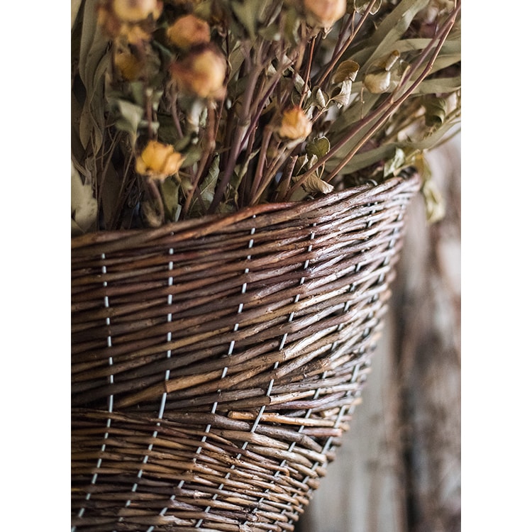 Horn Shape Willow Hanging Basket Planter in brown, showcasing its unique design and natural material.