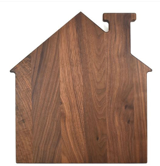 House shaped acacia wood cutting board measuring 13" x 14", perfect for serving and cutting.