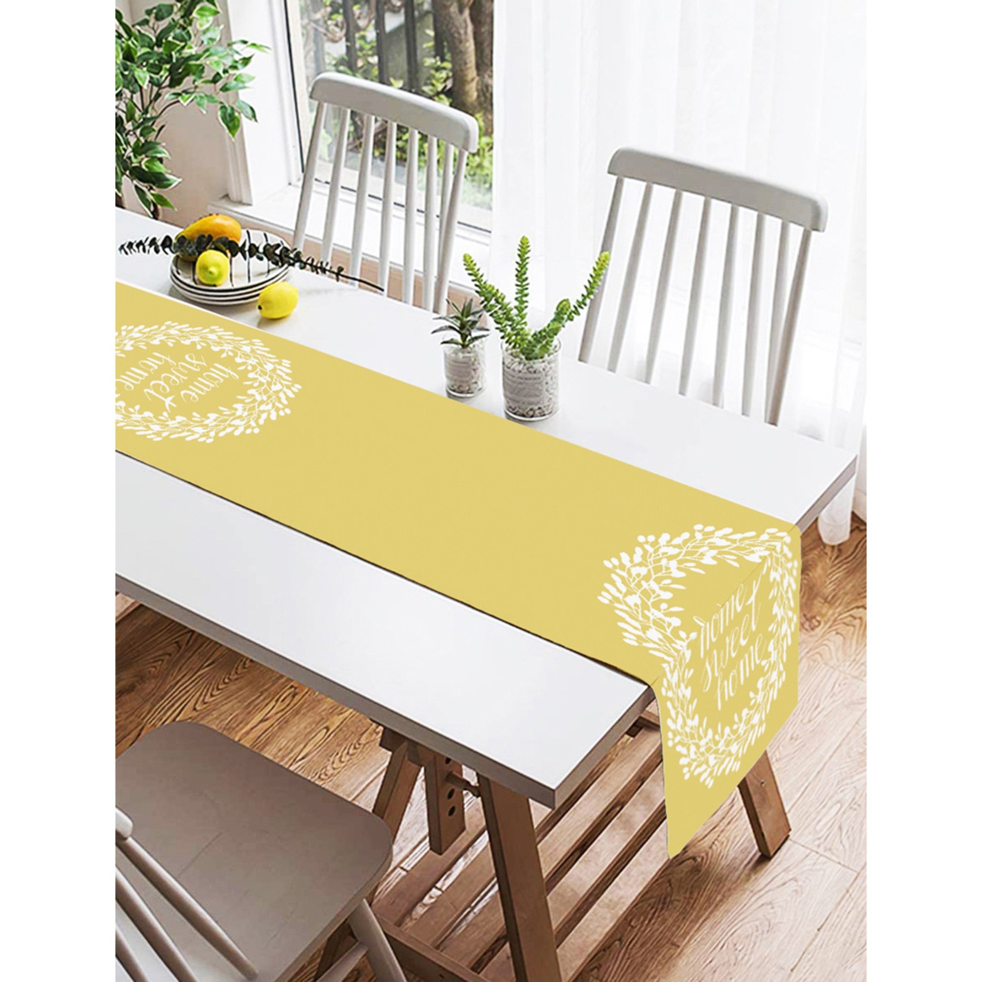 A vibrant yellow table runner with vivid 3D digital prints, perfect for home decor and dining occasions.