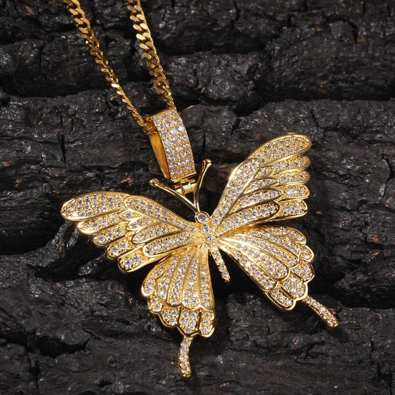 Iced Out Pendant Necklace featuring a butterfly design in gold and silver, adorned with cubic zirconia stones.