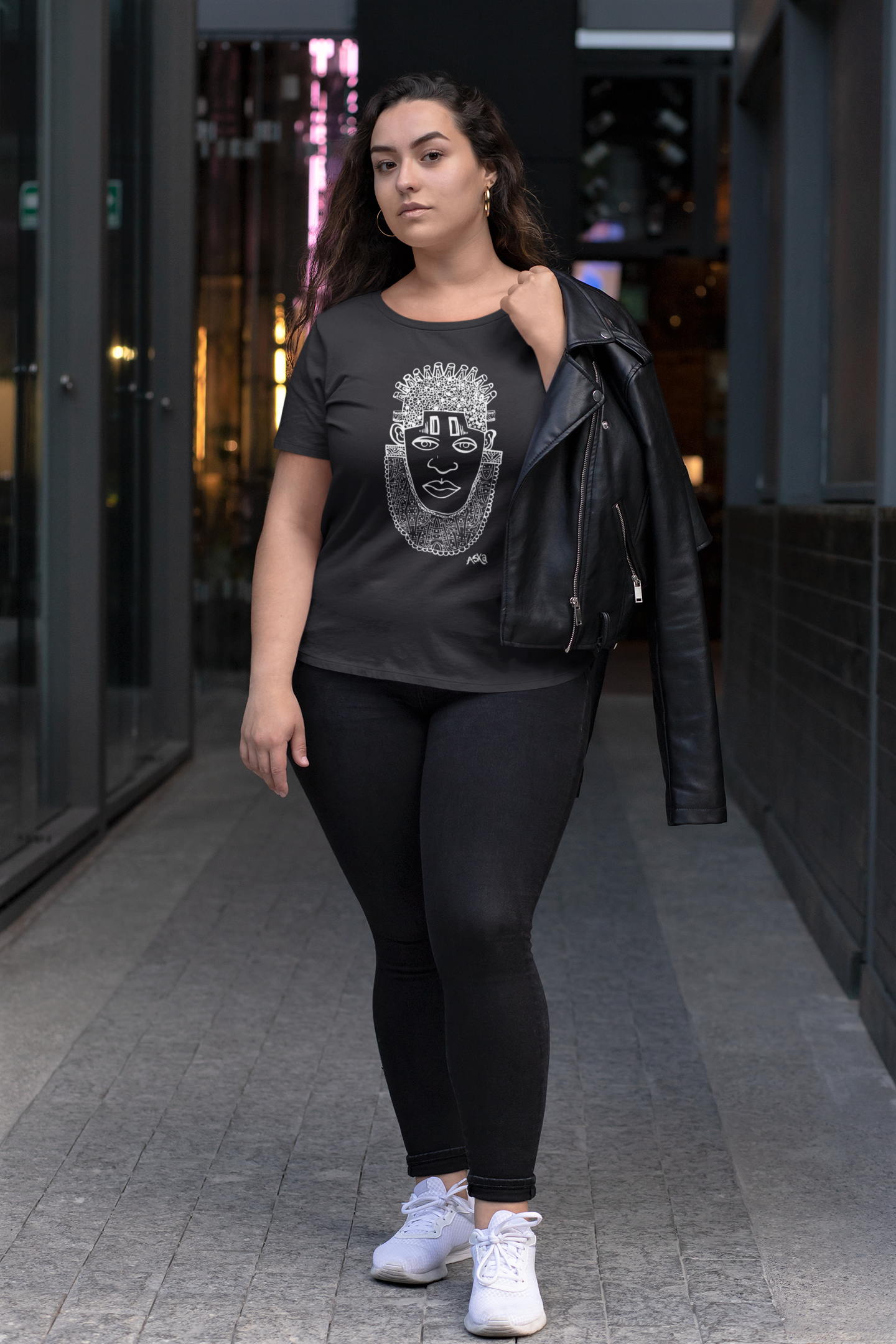 IDIA Art Earth Positive Tee featuring Queen IDIA design in white on black, made from 100% organic cotton.