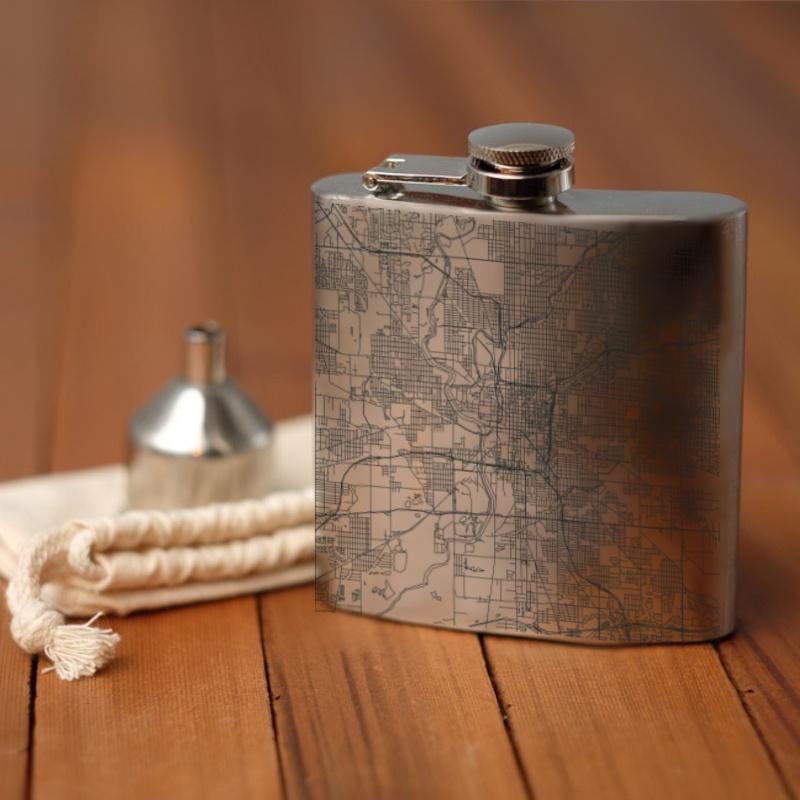 Custom engraved 6oz hip flask featuring a detailed map of Indianapolis, Indiana, with coordinates, presented with a canvas bag and funnel.