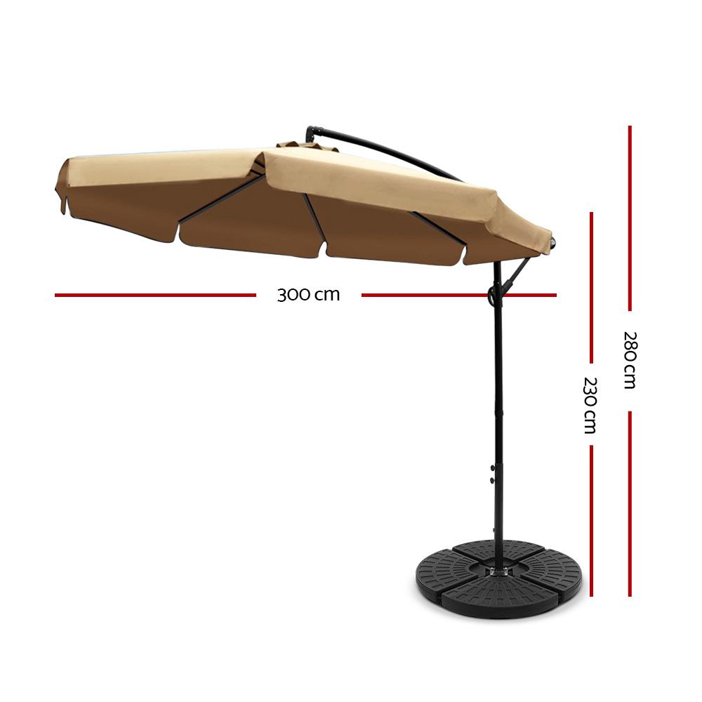 Instahut 3M Cantilever Outdoor Umbrella with beige fabric and sturdy black base, perfect for outdoor relaxation.