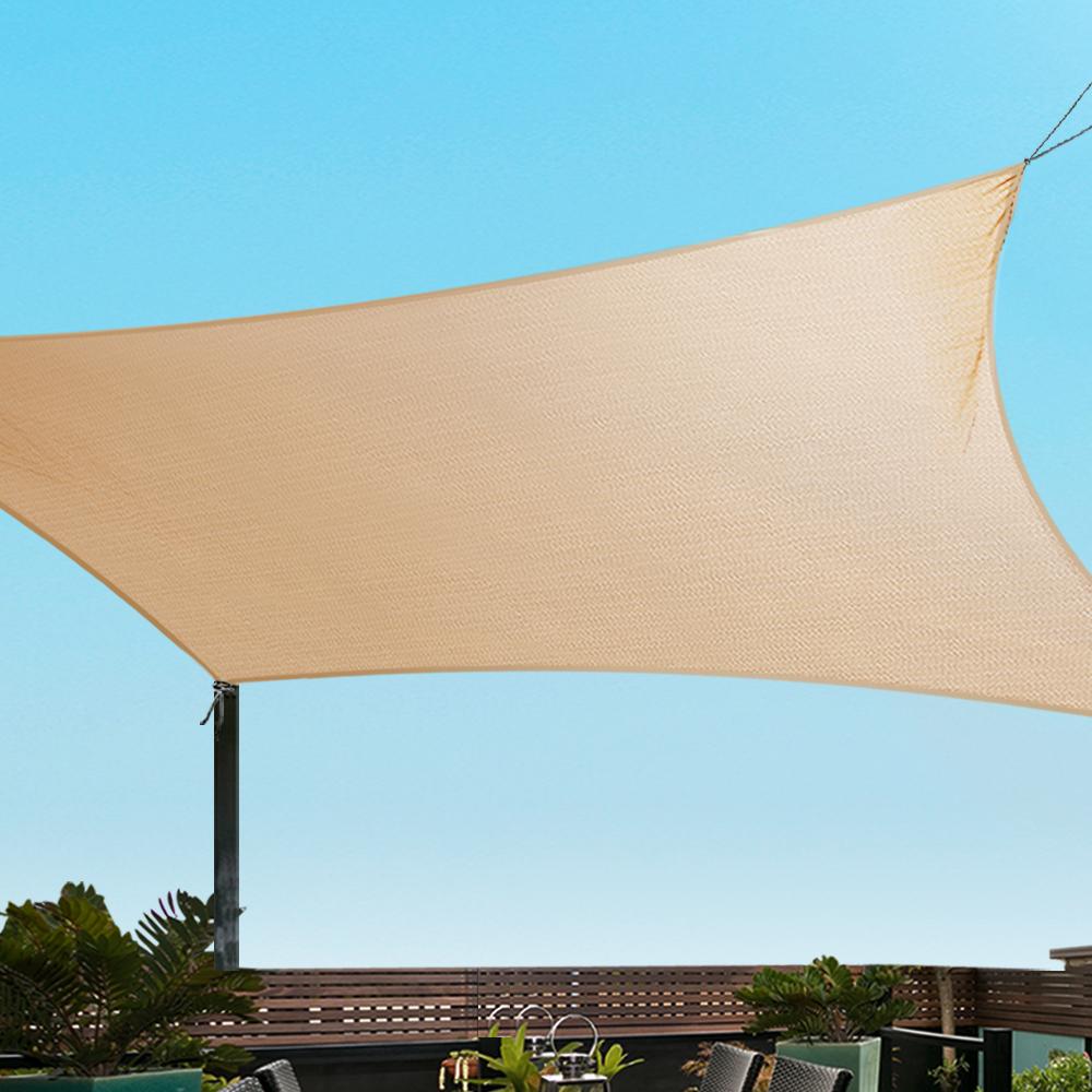 Instahut 6x6m Shade Sail in sand beige, showcasing its durable fabric and stainless steel buckles, ideal for outdoor sun protection.